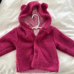 Pink fleece jacket with magnetic closure